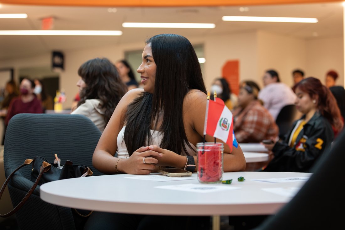 A student sitting at a table.