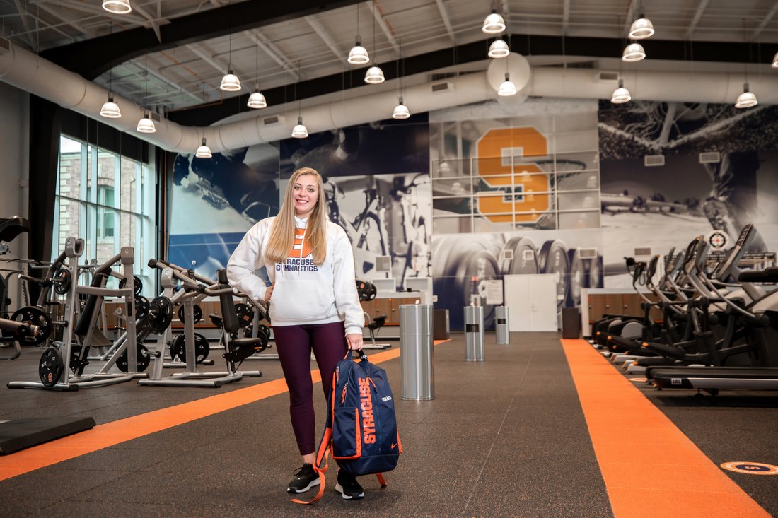 A person standing in a fitness center