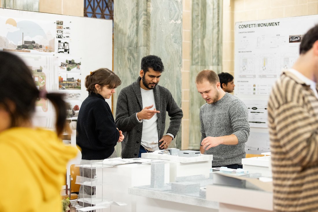 Students in visiting critic class participate in their final review.