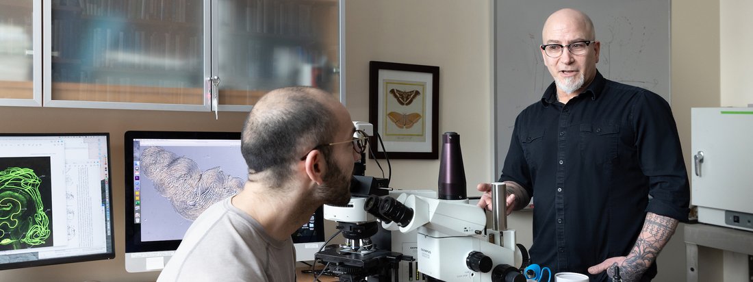 Two people in a biotechnology lab.