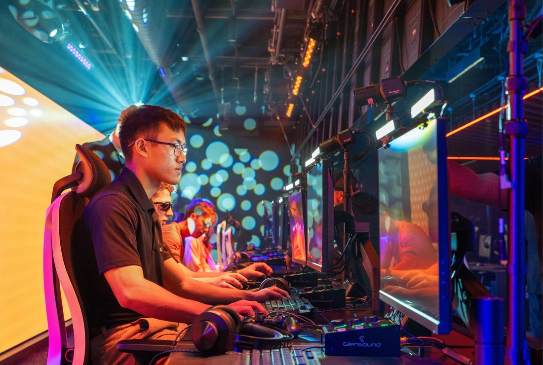 Student in the Esports Gaming Center on a computer.