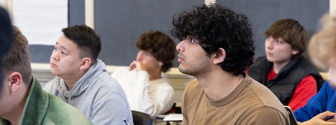 Maxwell students listen to a classroom lecture.