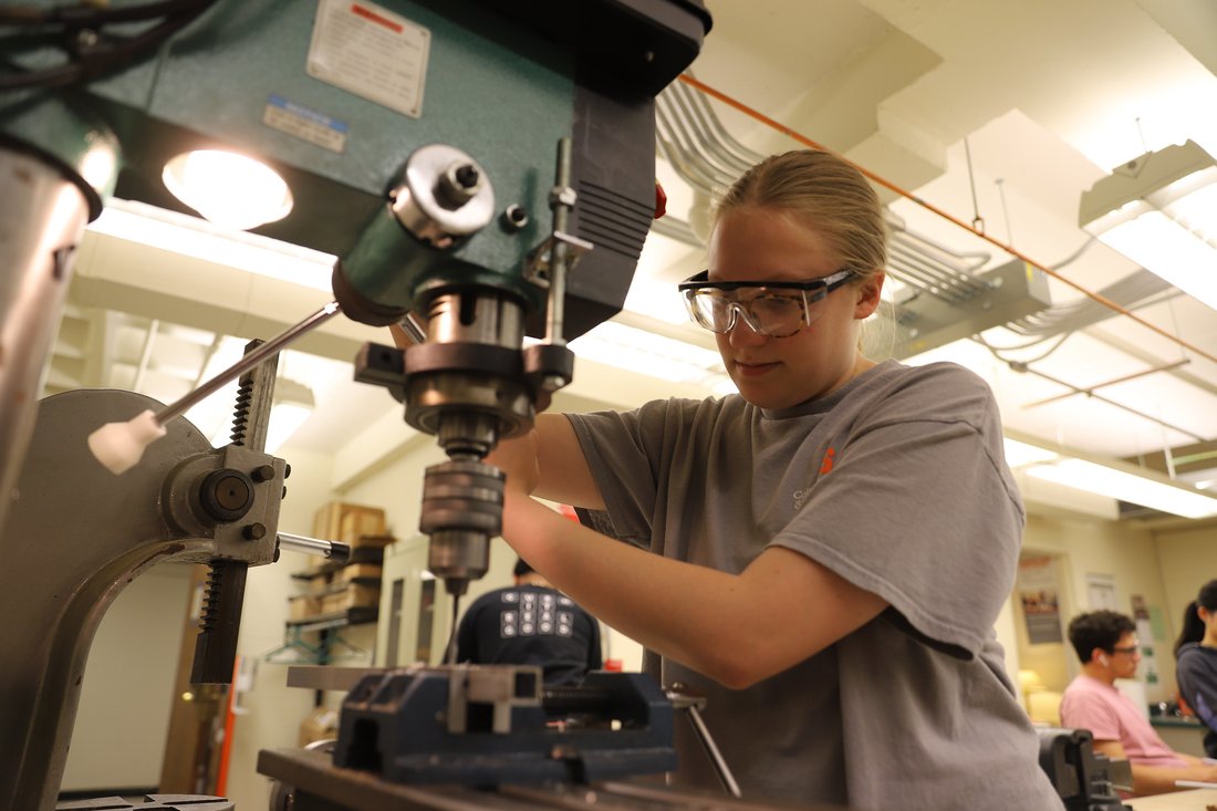 Person working with some form of heavy machinery.