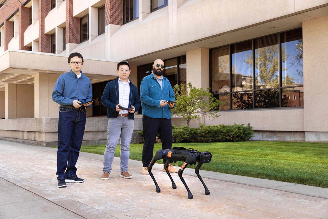 Professor Zhenyu Gan with robotic dog