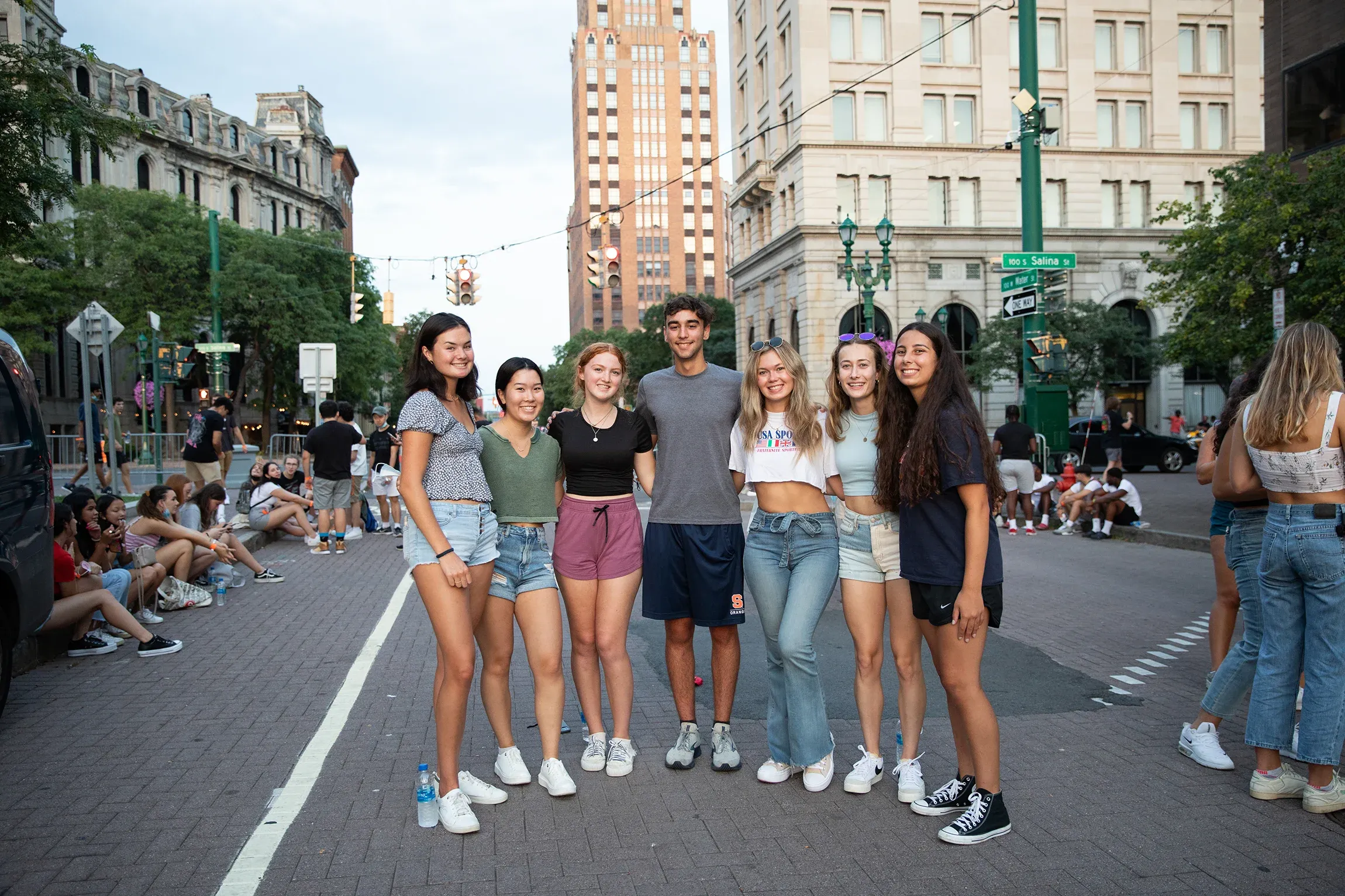 Students pose for a picture in downtown Syracuse.